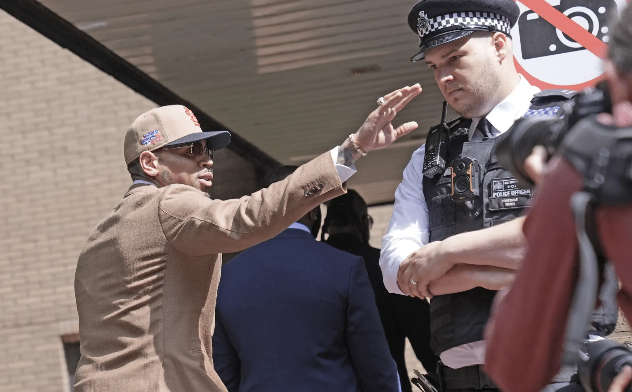 Chris Brown pleads guilty in London bottle attack, sentencing set for October